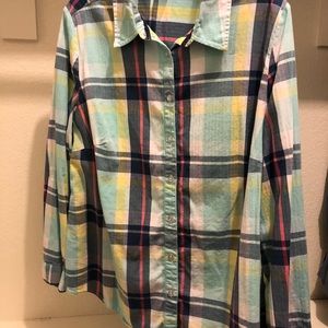 Women’s plaid button down shirt.